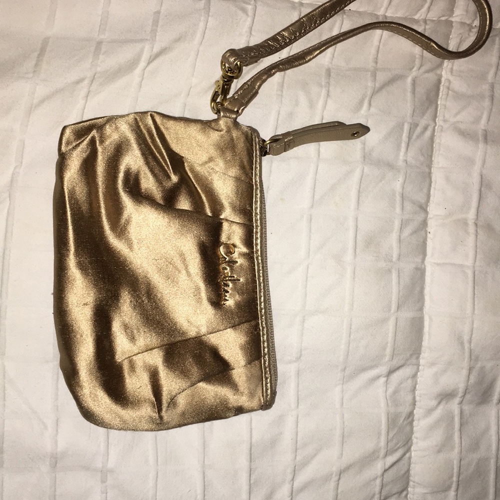 Cole haan gold wristlet